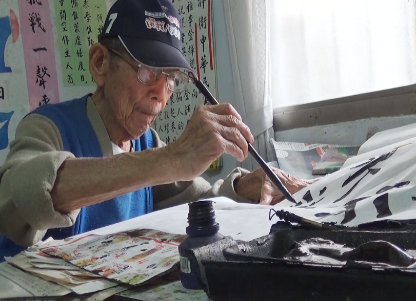 慈濟關懷陪伴弱勢家庭與長者 台南辦「生命的轉角．看到愛」美展